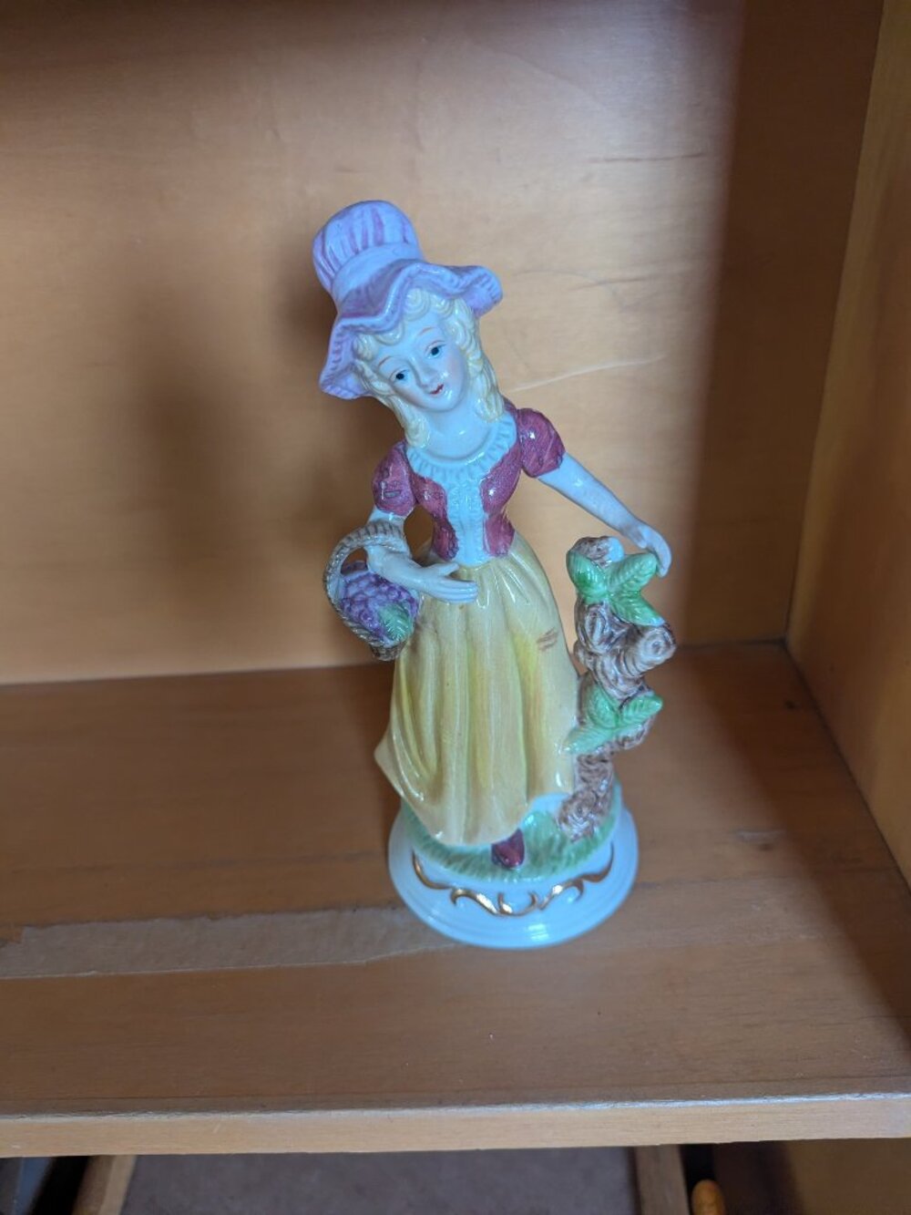 Porcelain Girl with Grapes